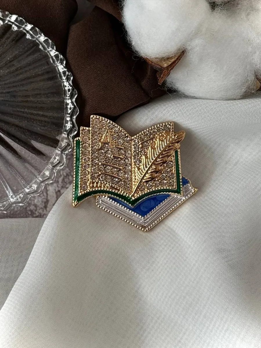 Купити Брошка«Синя книга»